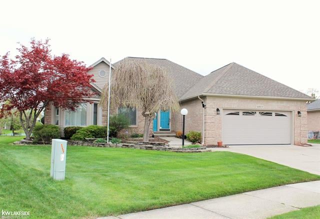 front view picture of 48509 Penrose Ln, Macomb, MI. 48044