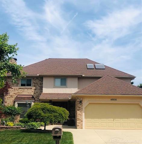 front view picture of 48656 Presidential D, Macomb, MI. 48044