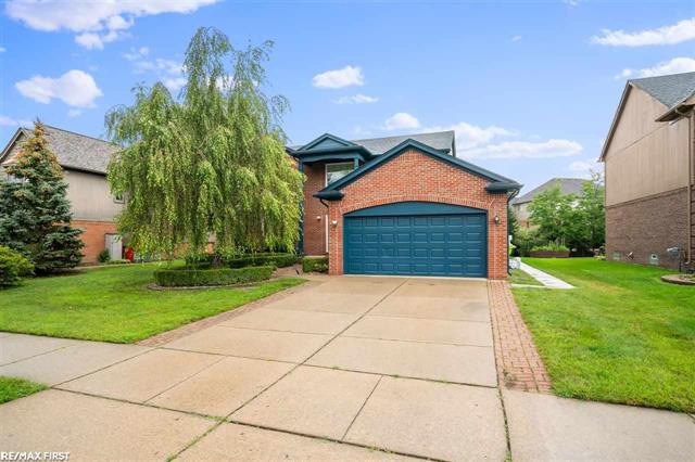 front view picture of 21227 Summerfield Dr, Macomb, MI. 48044