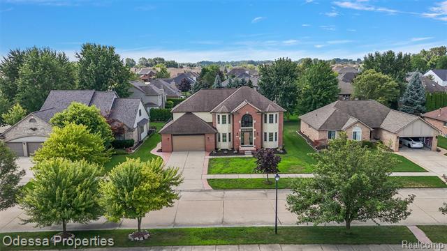 front view picture of 20918 Corey Dr, Macomb, MI. 48044