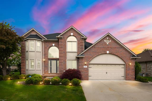 front view picture of 48301 Park Place Dr, Macomb, MI. 48044