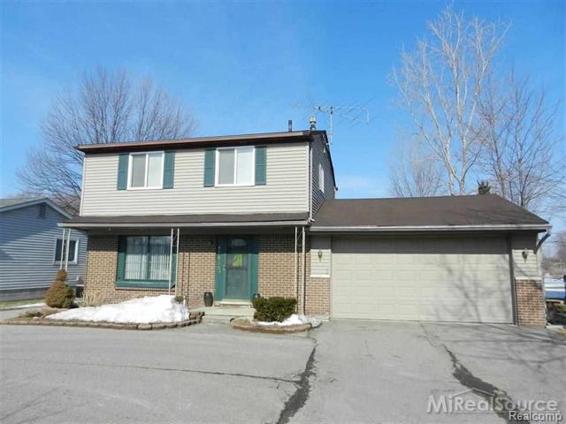 front view picture of 47839 Jefferson, New Baltimore, MI. 48047