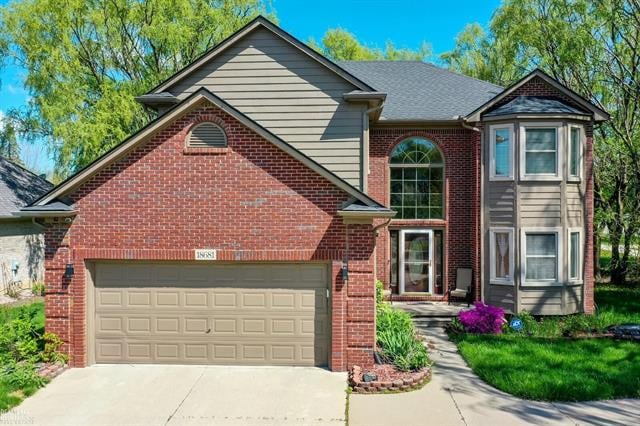 front view picture of 18681 Turnberry Dr, Macomb, MI. 48044
