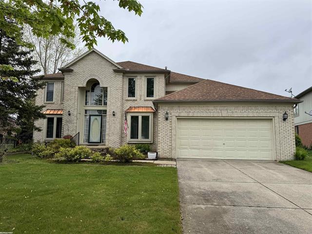 front view picture of 48753 Cross Creek Dr, Macomb, MI. 48044