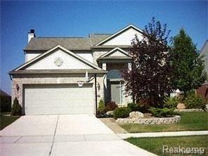 front view picture of 49515 Crusader Dr, Macomb, MI. 48044