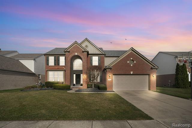 front view picture of 50068 Crusader Dr, Macomb, MI. 48044
