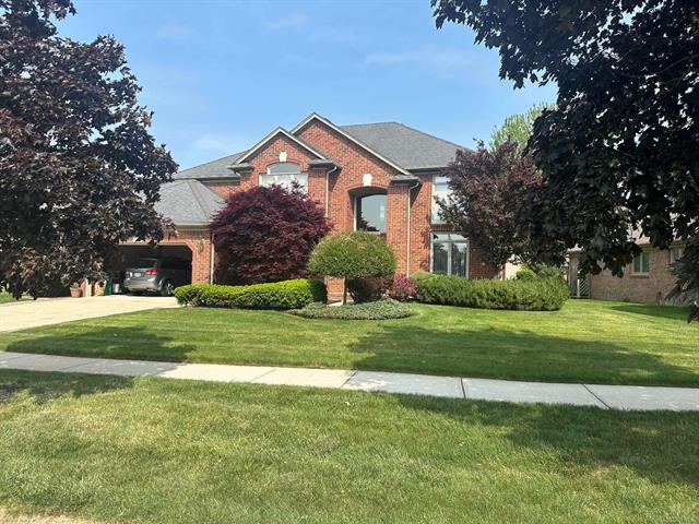 front view picture of 48274 Prestwyck Dr, Macomb, MI. 48044