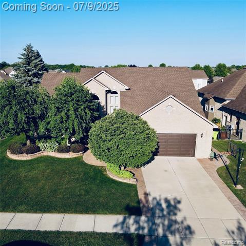 front view picture of 51798 Sequoya Dr, Macomb, MI. 48042