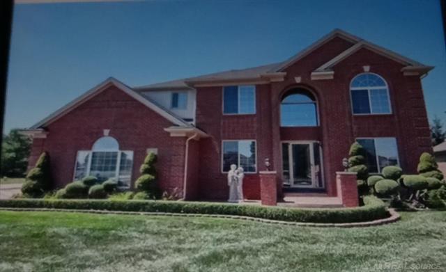 front view picture of 51381 Mauro Ln, Macomb, MI. 48042