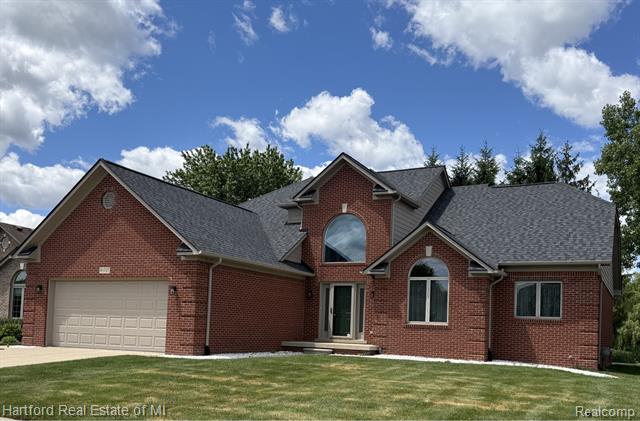 front view picture of 50727 Russell Dr, Macomb, MI. 48044