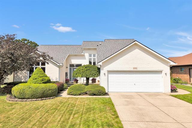 front view picture of 51721 Blue Spruce Dr, Macomb, MI. 48042