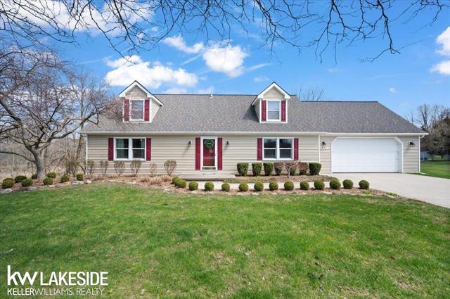 front view picture of 51980 Romeo Plank Rd, Macomb, MI. 48042