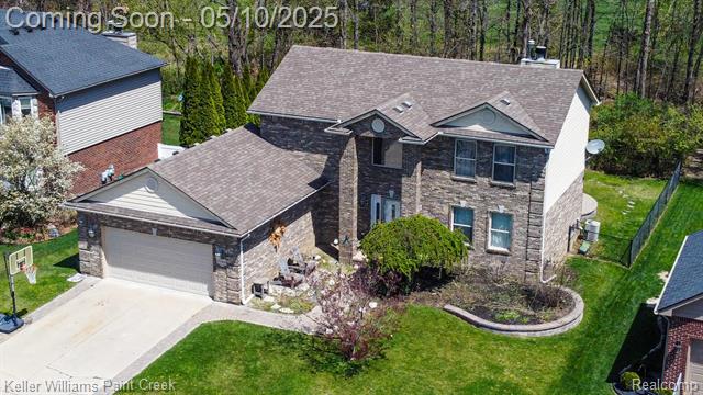 front view picture of 51466 Promenade Ln, New Baltimore, MI. 48047