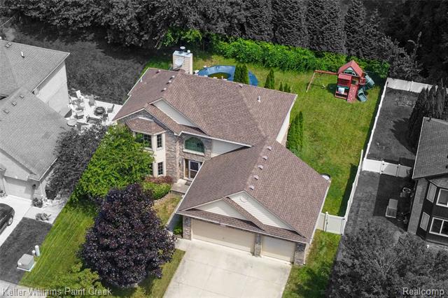 front view picture of 51610 Promenade Ln, New Baltimore, MI. 48047