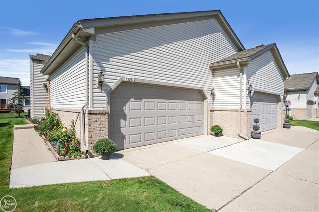 front view picture of 53261 Butternut St, New Baltimore, MI. 48051