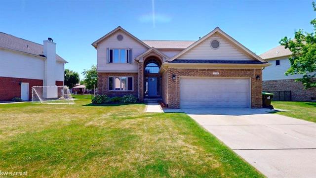front view picture of 53266 Forestglade Dr, New Baltimore, MI. 48047