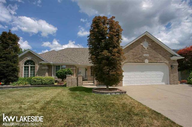 front view picture of 54572 Malheur Dr, Macomb, MI. 48042