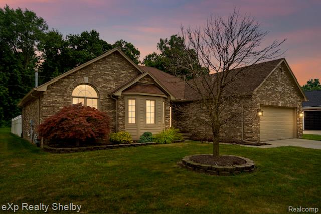 front view picture of 54256 Oconee Dr, Macomb, MI. 48042