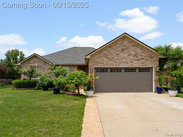 front view picture of 55589 Raspberry Dr, Macomb, MI. 48042