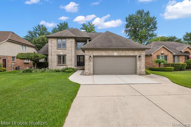 front view picture of 18460 Ranier Dr, Macomb, MI. 48042