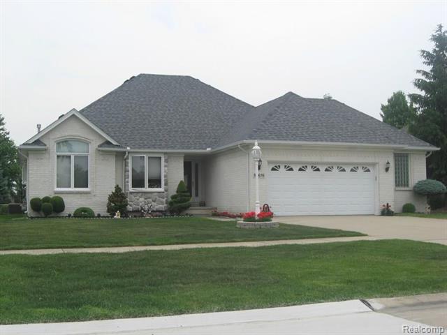 front view picture of 54676 Carnation Dr, Macomb, MI. 48042