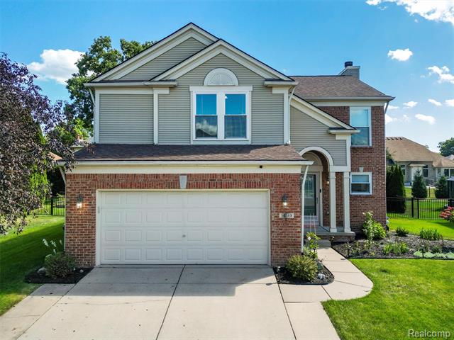 front view picture of 54148 Audubon Dr, Macomb, MI. 48042