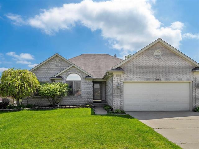 front view picture of 55374 Raspberry Dr, Macomb, MI. 48042