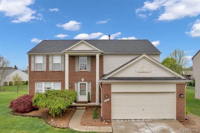 front view picture of 17982 Troon Trail, Macomb, MI. 48042