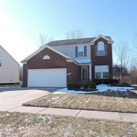 front view picture of 18802 Brighton Dr, Macomb, MI. 48042