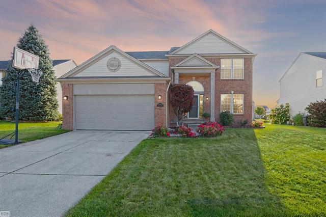 front view picture of 56700 Honey Ct, Macomb, MI. 48042
