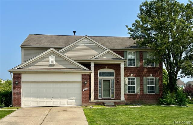 front view picture of 56782 Inland Ct, Macomb, MI. 48042