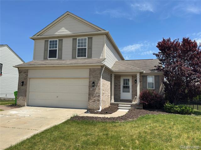 front view picture of 56602 Winding Creek, Macomb, MI. 48042