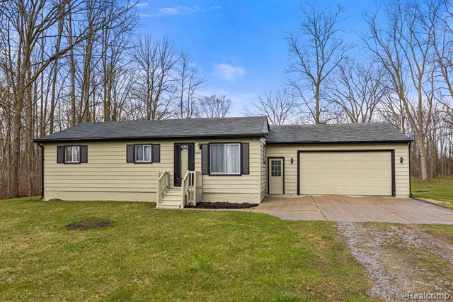 front view picture of 63325 Place, New Haven, MI. 48050