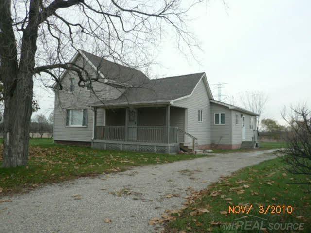 front view picture of 76540 Andrews Rd, Richmond, MI. 48062