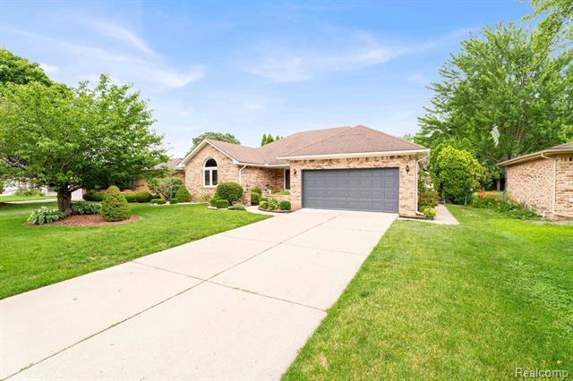 front view picture of 37452 Dundee St, Sterling Heights, MI. 48310