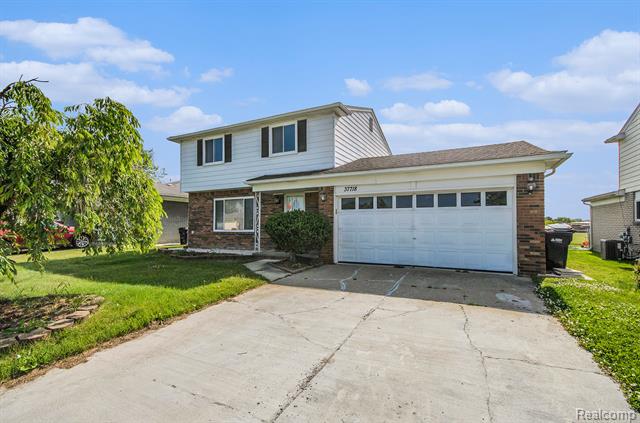 front view picture of 37718 Douglas Court, Sterling Heights, MI. 48310