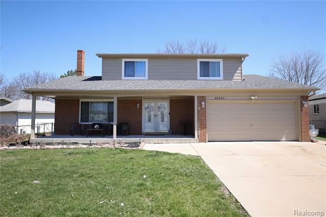 front view picture of 38684 Pinebrook Dr, Sterling Heights, MI. 48310