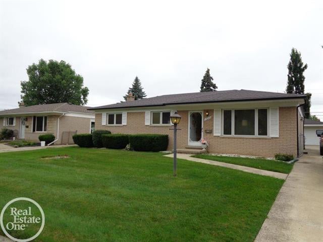 front view picture of 13033 Plumbrook Road, Sterling Heights, MI. 48312