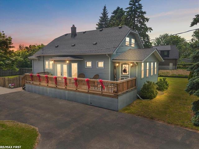front view picture of 15900 Clinton River, Clinton Township, MI. 48038