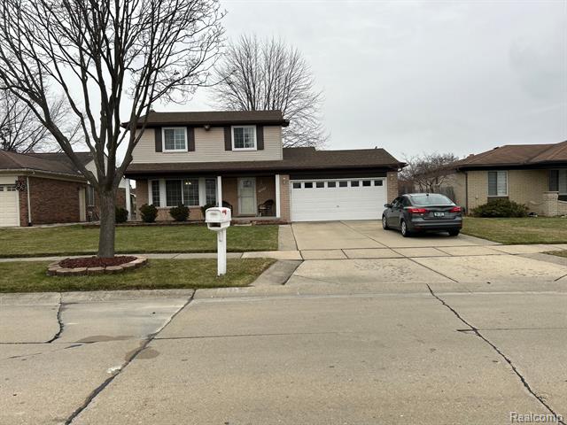 front view picture of 38614 Sutton Dr, Sterling Heights, MI. 48310