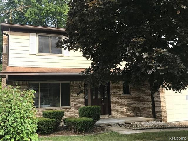 front view picture of 39679 Baker Dr, Sterling Heights, MI. 48310