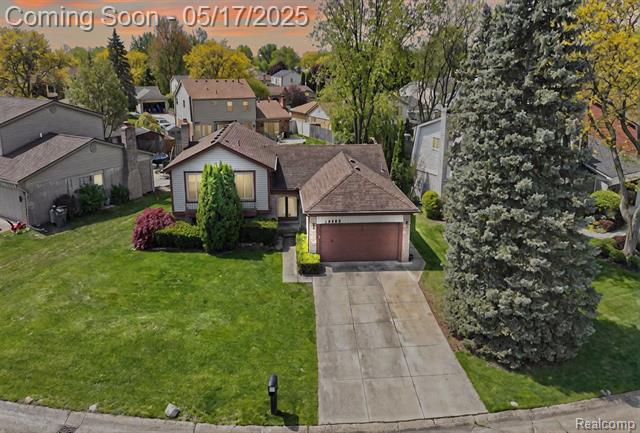 front view picture of 15690 Grainger, Clinton Township, MI. 48038
