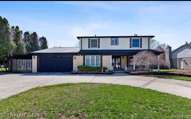 front view picture of 17324 Merryweather, Clinton Township, MI. 48038