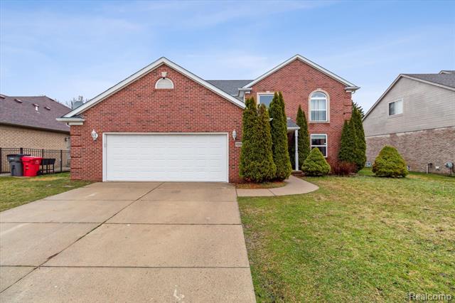 front view picture of 41664 Stonehenge Man, Clinton Township, MI. 48038