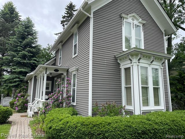 front view picture of 45647 Cass Ave, Utica, MI. 48317
