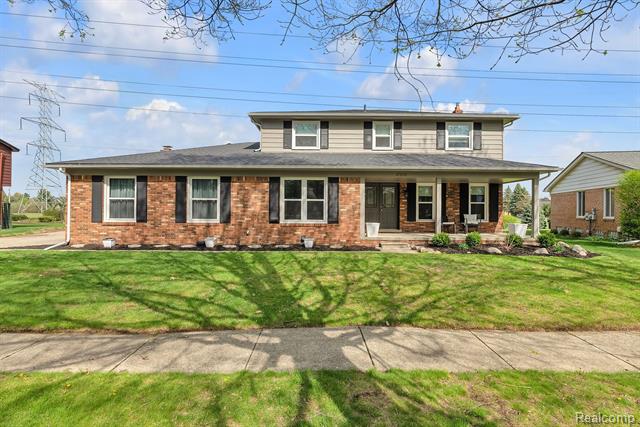 front view picture of 47266 Warwick Ct, Utica, MI. 48315