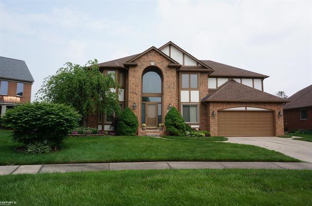 front view picture of 49954 Willowood Dr, Macomb, MI. 48044
