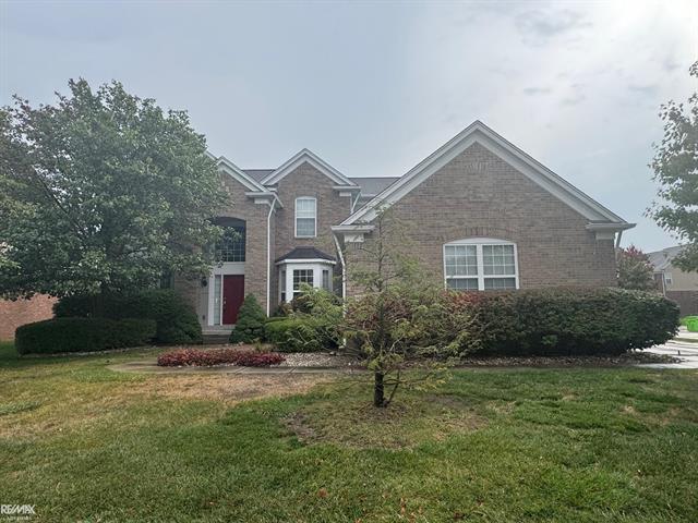 front view picture of 49470 Tottenham Ln, Macomb, MI. 48044