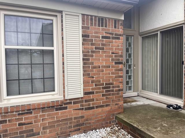 front view picture of 49230 Chestnut Hill Ct, Utica, MI. 48315