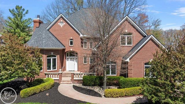 front view picture of 12277 Forest Glen Ln, Utica, MI. 48315